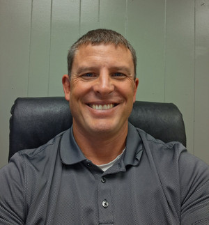 Peter Moe, Hustisford Principal